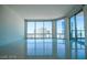 Spacious living area featuring large windows with city views at 222 Karen Ave # 2601, Las Vegas, NV 89109