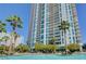 Luxury high-rise building with swimming pool and palm trees at 222 Karen Ave # 2601, Las Vegas, NV 89109