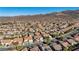 Aerial view of a residential neighborhood with numerous homes and mountain backdrop at 2356 Weaverville Dr, Henderson, NV 89044