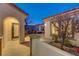 Well-lit entryway with arched doorway and side courtyard at 2356 Weaverville Dr, Henderson, NV 89044