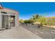 Covered patio adjacent to sunroom, overlooks landscaped yard at 2356 Weaverville Dr, Henderson, NV 89044