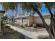 Side view of home with walkway and landscaping at 2471 Sabado St, Las Vegas, NV 89121