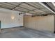 Attached garage with built-in storage cabinets at 2471 Sabado St, Las Vegas, NV 89121