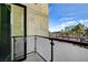 Private balcony with glass panels and city views at 353 E Bonneville Ave # 457, Las Vegas, NV 89101