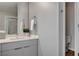 Modern bathroom with gray vanity, shower, and toilet at 353 E Bonneville Ave # 457, Las Vegas, NV 89101