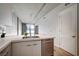 Modern kitchen with island, sink, and dishwasher at 353 E Bonneville Ave # 457, Las Vegas, NV 89101