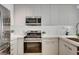 Modern kitchen features with stainless steel appliances and white subway tile at 353 E Bonneville Ave # 457, Las Vegas, NV 89101