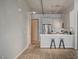 Modern kitchen with white cabinets, stainless steel appliances, and breakfast bar at 353 E Bonneville Ave # 457, Las Vegas, NV 89101