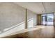 Spacious living room with hardwood floors and large windows at 353 E Bonneville Ave # 457, Las Vegas, NV 89101