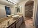 Bathroom features granite countertop, modern sink, and a large walk-in shower at 3761 Desert Marina Dr # 81, Laughlin, NV 89029