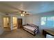 Bedroom with a daybed, ceiling fan, and built-in shelving at 3761 Desert Marina Dr # 81, Laughlin, NV 89029