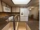 Kitchen sink and countertops with stainless steel appliances at 3761 Desert Marina Dr # 81, Laughlin, NV 89029