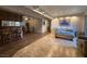 Living room with wood floors and view of dining area at 3761 Desert Marina Dr # 81, Laughlin, NV 89029