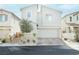 Two-story modern home with attached garage and landscaped front yard at 43 Flora Sagio Ave, Henderson, NV 89011