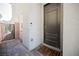 Dark brown front door with a brick walkway and gate at 43 Flora Sagio Ave, Henderson, NV 89011