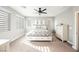 Main bedroom with king bed, dresser, and plenty of natural light at 43 Flora Sagio Ave, Henderson, NV 89011