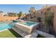 Relaxing spa nestled in a beautifully landscaped backyard at 43 Flora Sagio Ave, Henderson, NV 89011