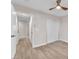Bright bedroom featuring wood-look flooring and a ceiling fan for a comfortable atmosphere at 4536 Rolls Royce Rd, North Las Vegas, NV 89031
