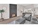 Open-concept living area featuring a stylish fireplace and views into the kitchen at 4536 Rolls Royce Rd, North Las Vegas, NV 89031