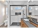 Modern main bathroom with glass shower and modern fixtures at 4536 Rolls Royce Rd, North Las Vegas, NV 89031