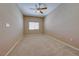 Spacious bedroom with ceiling fan and neutral decor at 4607 El Camino Cabos Dr, Las Vegas, NV 89147