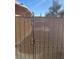 Metal gate providing access to the backyard at 4804 Apawana Ln, Las Vegas, NV 89108