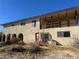 Two story home with covered patio and a large yard at 4980 W Weddle Way, Moapa, NV 89025