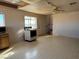 Kitchen features wood cabinets and tile floor at 4980 W Weddle Way, Moapa, NV 89025