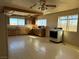 Bright kitchen with wood cabinets and tile flooring at 4980 W Weddle Way, Moapa, NV 89025