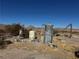 Property's water system with tanks and pipes at 4980 W Weddle Way, Moapa, NV 89025