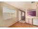 Dining area with wood floors and view to entryway and kitchen at 5101 Pioneer Ave # 101, Las Vegas, NV 89146