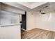 Simple dining area with wood-look flooring and ceiling fan at 578 Roxella Ln # C, Las Vegas, NV 89110