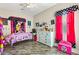 Charming bedroom with Minnie Mouse theme and built-in dresser at 7670 Frittata Ave, Las Vegas, NV 89113