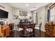Well-stocked home bar with a circular design and seating area at 7670 Frittata Ave, Las Vegas, NV 89113