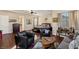 Relaxing main bedroom with sitting area and hardwood floors at 7670 Frittata Ave, Las Vegas, NV 89113