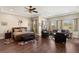 Large main bedroom with hardwood floors and sitting area at 7670 Frittata Ave, Las Vegas, NV 89113