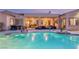 Luxury pool and spa with covered patio, perfect for entertaining at 7670 Frittata Ave, Las Vegas, NV 89113