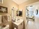 Updated bathroom with vanity and a view of bedroom at 7733 Allerton Ave, Las Vegas, NV 89128