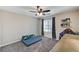 bedroom with playful decor and a ceiling fan at 7745 Rosebark Cliffs St, North Las Vegas, NV 89084