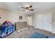 bedroom with double doors to a closet at 7745 Rosebark Cliffs St, North Las Vegas, NV 89084