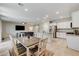 Open concept dining room with access to backyard at 7745 Rosebark Cliffs St, North Las Vegas, NV 89084