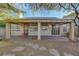 Covered patio with ceiling fan, offering shade and outdoor living space at 8482 Lambert Dr, Las Vegas, NV 89147