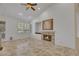 Gathering room with fireplace and built-in shelving at 8482 Lambert Dr, Las Vegas, NV 89147