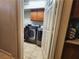 Laundry room with washer, dryer, and cabinets at 8743 Mount Mira Loma Ave, Las Vegas, NV 89178