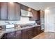 Kitchen with stainless steel appliances and granite countertops at 10581 Olinda St, Las Vegas, NV 89179