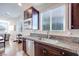 Kitchen with stainless steel sink and granite countertops at 10581 Olinda St, Las Vegas, NV 89179