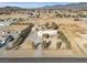 Aerial view of the house and surrounding desert landscape at 1230 Bruce St, Pahrump, NV 89048