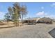 Large backyard with gravel area and mature trees at 1230 Bruce St, Pahrump, NV 89048