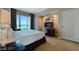 Spacious bedroom with large windows and city views at 125 E Harmon Ave # 2814, Las Vegas, NV 89109