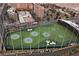 Aerial view of a driving range with multiple hitting bays at 125 E Harmon Ave # 2816, Las Vegas, NV 89109